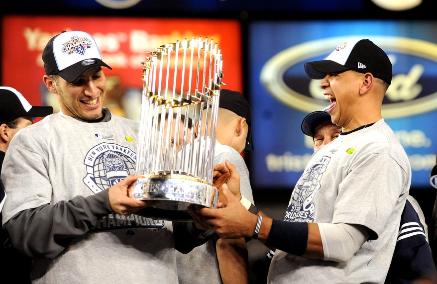 Andy Pettitte and Alex Rodriguez celebrate after the Yankees won the World Series in 2009