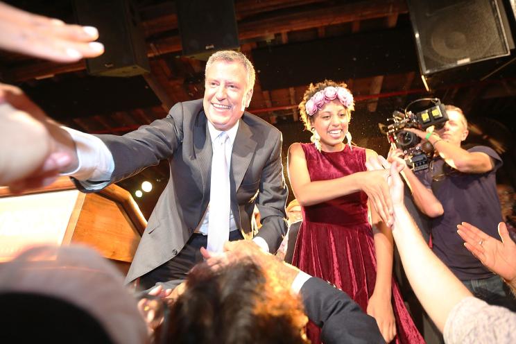 Democratic candidate for Mayor Bill de Blasio, left, and daughter Chiara, right, celebrate at his primary night party.