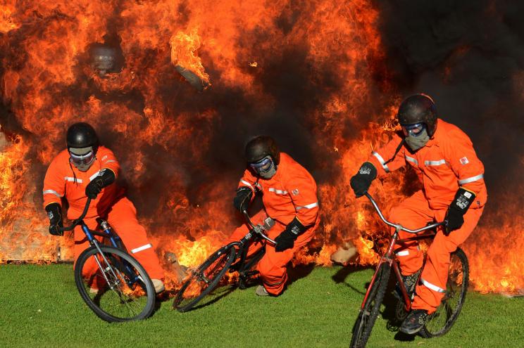 The Findon Skid Kids leap through the flames on September 22, 2013