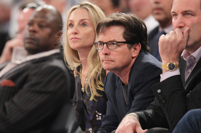 Tracy Pollan and Michael J. Fox root for the Knicks at Madison Square Garden.