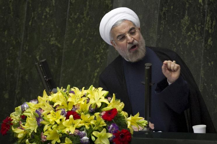 Iranian President Hassan Rouhani delivers a speech at Iran's Majils.