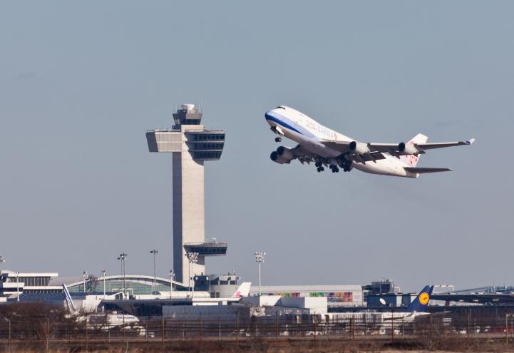 A plane taking off from New York's JFK airport where "ramp rats" were caught trying to steal travelers' luggage.