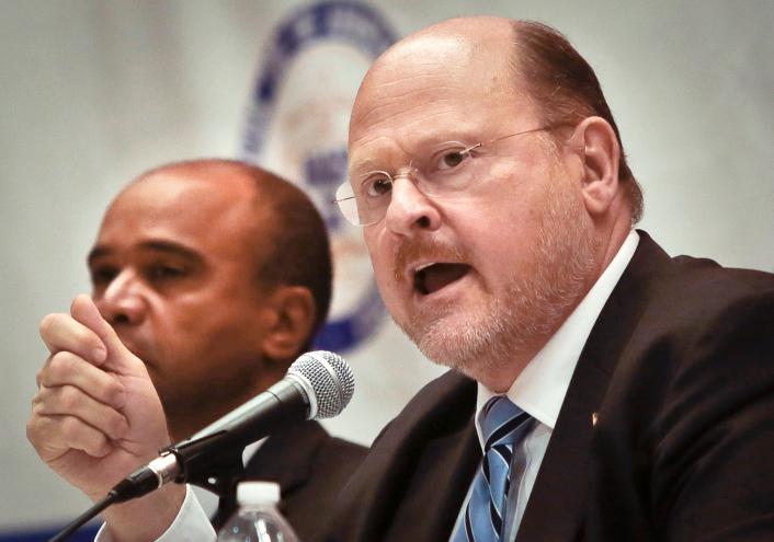 New York City mayoral candidate Joe Lhota, right, speaks during AARP's town hall forum at Hunter College in New York. AP