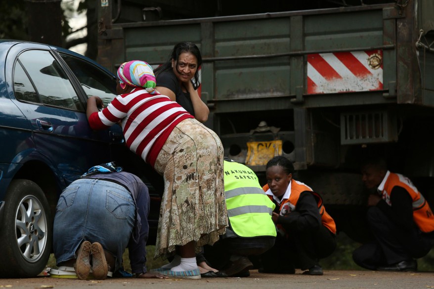 People take cover after hearing gun shots