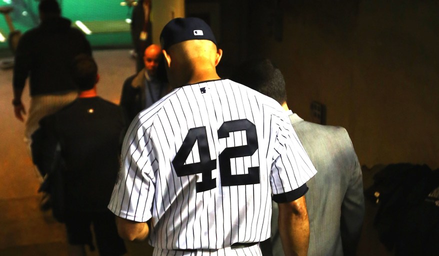 Mariano Rivera leaves the dugout after the game