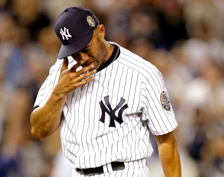 Mariano Rivera walks off the mound with tears in his eyes