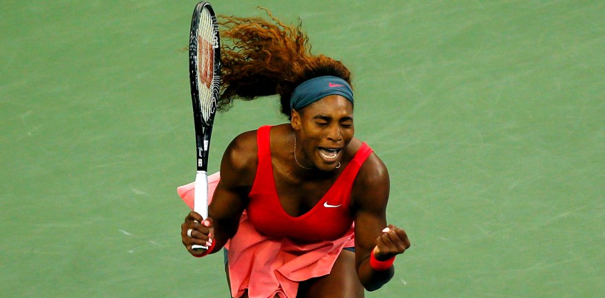 Serena Williams lets out a yell after winning the women’s final.