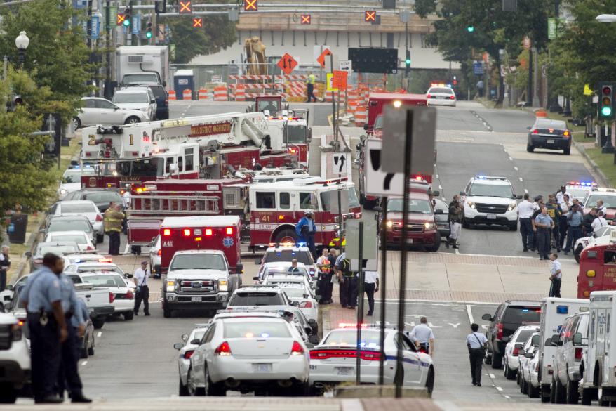 Police and firefighters respond to a shooting at the Navy Yard in Washington, D.C.