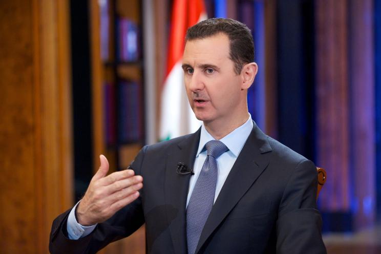 Syrian President Bashar al-Assad speaks during an interview with Fox News channel, in Damascus.