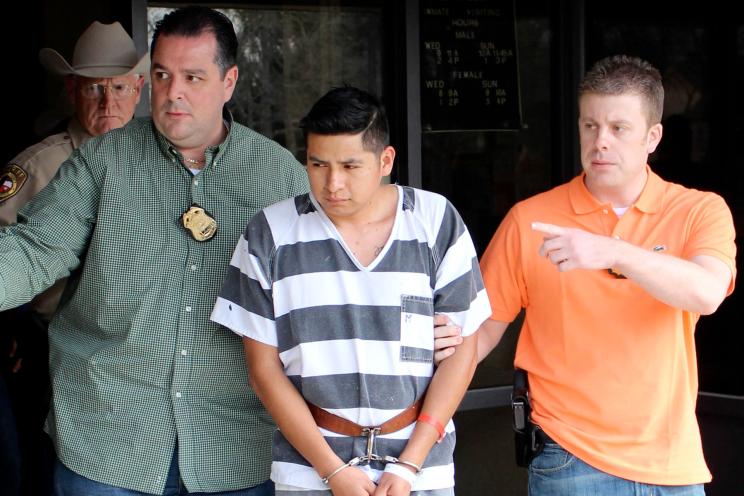 Miguel Mejias-Ramos is walked from Fayette County Jail in La Grange, Texas on his way back to New York.