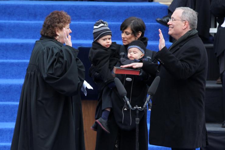 Scott Stringer gets sworn in as city comptroller as his wife and children look on.