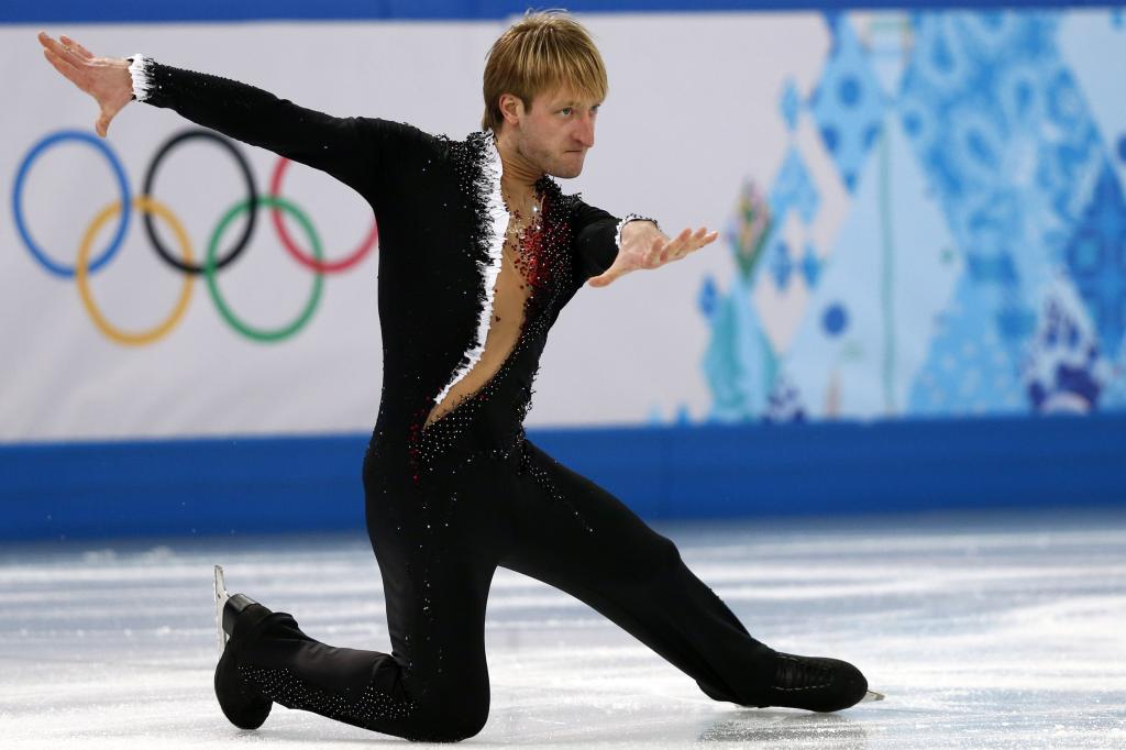 Russia's Yevgeny Plushenko performs in the Men's Figure Skating Team Short Program at the Iceberg Skating Palace during the Sochi Winter Olympics on February 6, 2014. AFP PHOTO / ADRIAN DENNISADRIAN DENNIS/AFP/Getty Images