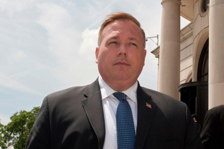 Former NYC Councilman Daniel Halloran walks from the White Plains , N.Y. Federal Court House with his attorneys on Wednesday, June 4.