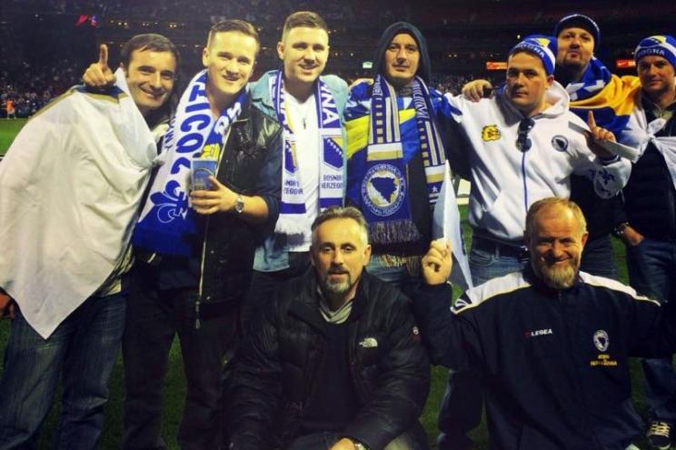 Adis Radoncic (far left), Halil Todic (second from left) and Salko Radoncic (fourth from left), say they were beat up by security guards after they returned to the Four Seasons hotel in their Bosnia-Herzegovina soccer garb.