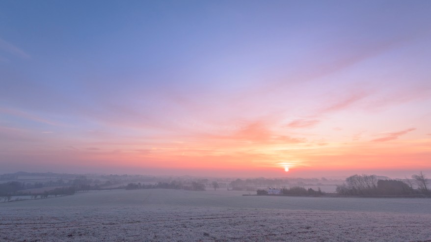 SOMERSET, UNITED KINGDOM - JANUARY 23: Sunrise seen on a frosty morning in Vale of Taunton on January 23, 2015 in Somerset, England. PHOTOGRAPH BY iVistaphotography / Barcroft UK Office, London. T +44 845 370 2233 W www.barcroftmedia.com USA Office, New York City. T +1 212 796 2458 W www.barcroftusa.com Indian Office, Delhi. T +91 11 4053 2429 W www.barcroftindia.com