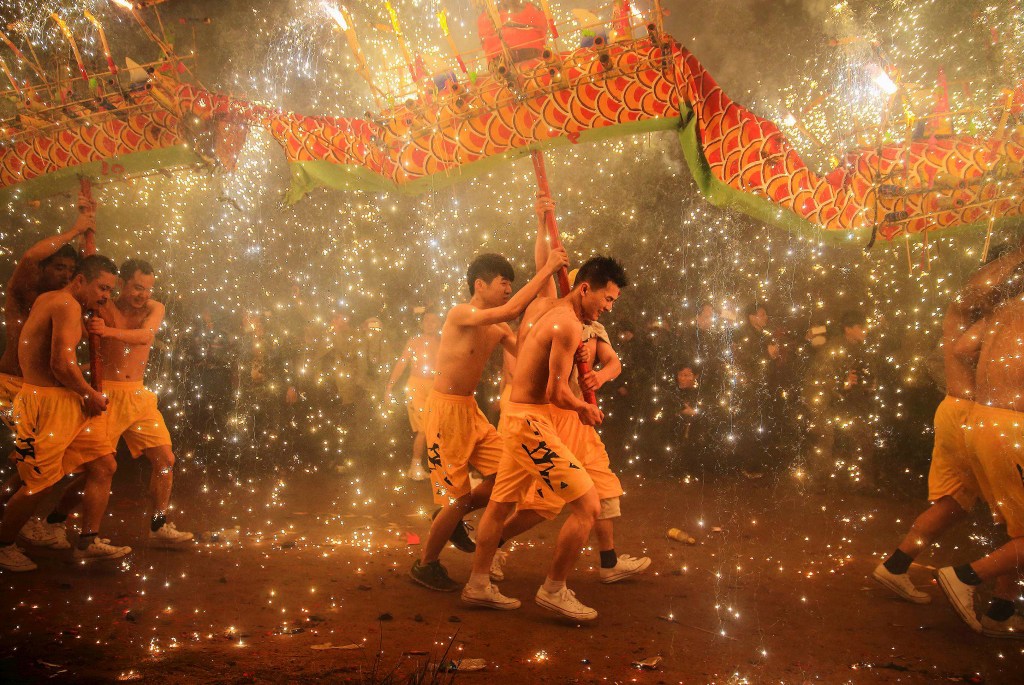 A dragon dance is performed in the Lantern Festival in Meizhou, China.