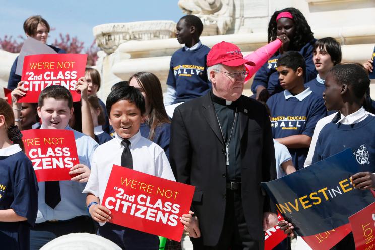 It's for the children: Buffalo Bishop Richard Malone rallying with students from local Catholic schools to support the Education Tax Credit last year.