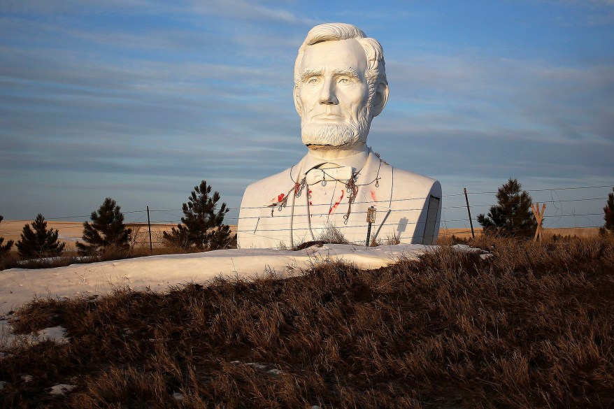 A giant bust of Lincoln by artist David Adickes in a field outside of Williston, N.D.