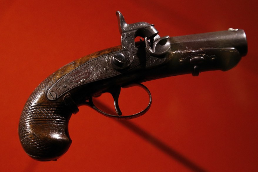 The single-shot Deringer pistol John Wilkes Booth used to kill Abraham Lincoln is displayed at the Center for Education and Leadership at Ford's Theatre in Washington.