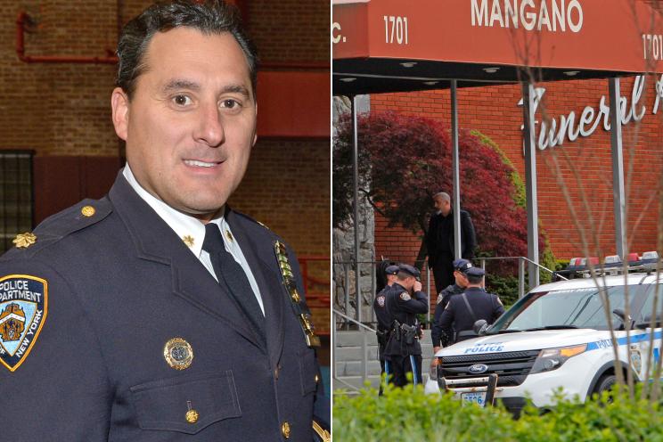 Cops gather outside the Mangano Funeral Home to honor Commander Michael Ameri (left).