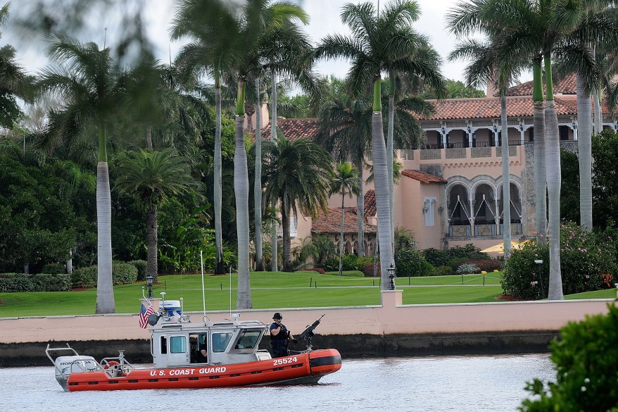 A Coast Guard boat passes Donald Trump's Mar-a-Lago resort in Palm Beach, Florida, where the President-elect will spend Thanksgiving.