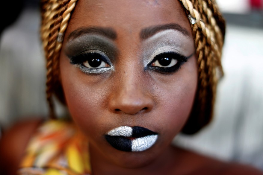 A model gets ready backstage for a Red Cross-organized fashion show in Ceuta, Spain.