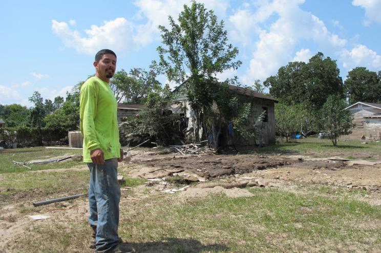 Rafael Casas tours his storm ravaged house in a small working-class neighborhood that sits between two Superfund sites in Crosby, Texas on Sept. 1.