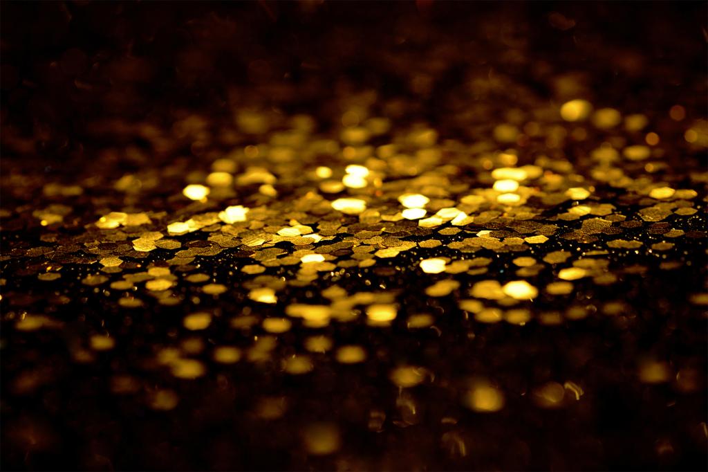 Golden glitter on black background