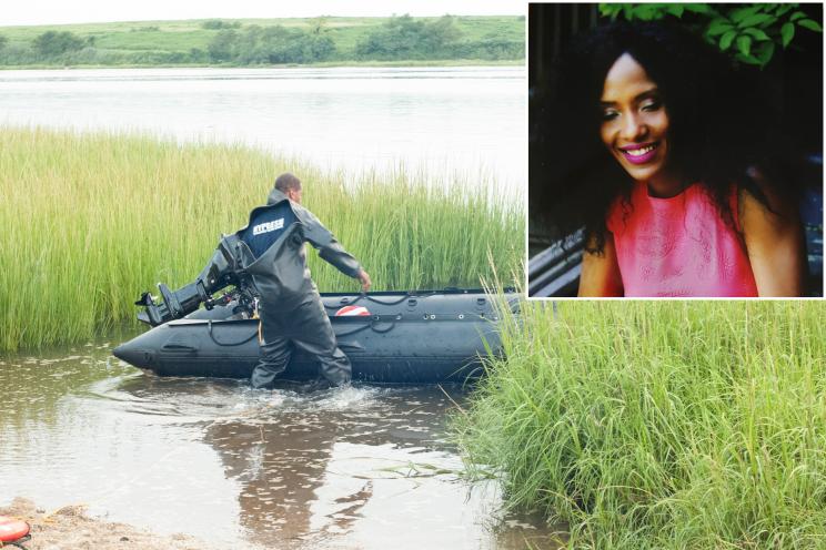 A rescue worker during the search for missing Queens woman Anna Clarke (inset).