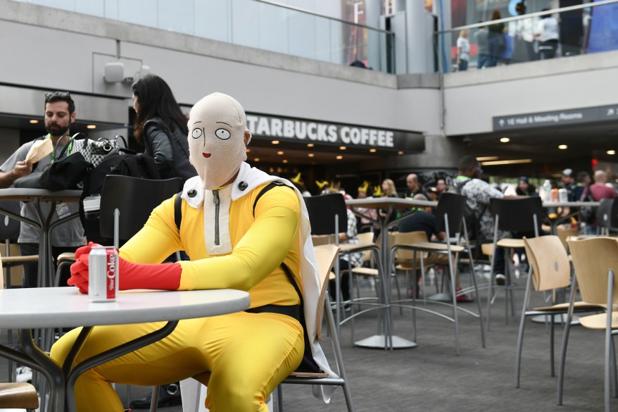 A fan cosplays as One Punch Man.