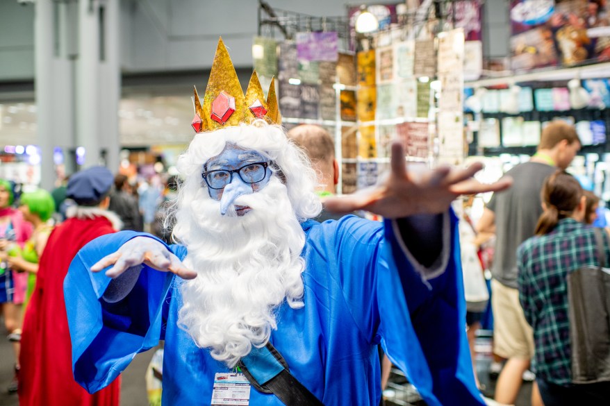 A fan cosplays as Ice King from Adventure Time.