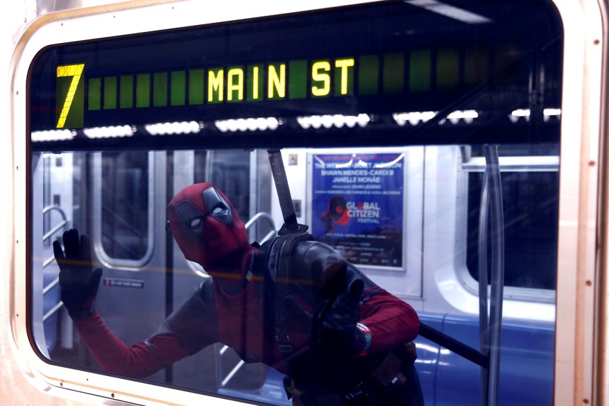 A fan cosplays as Deadpool.