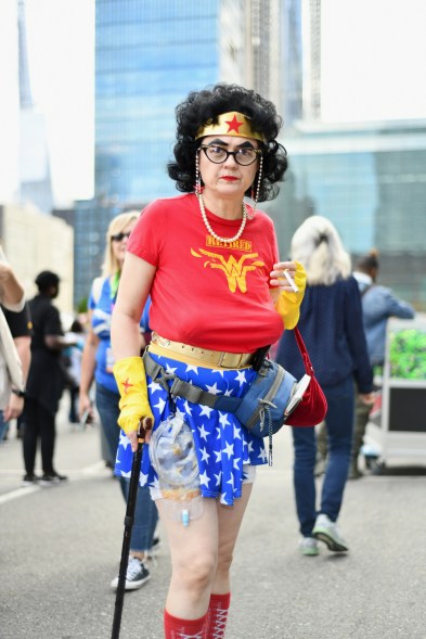 A fan cosplays as Wonder Woman.