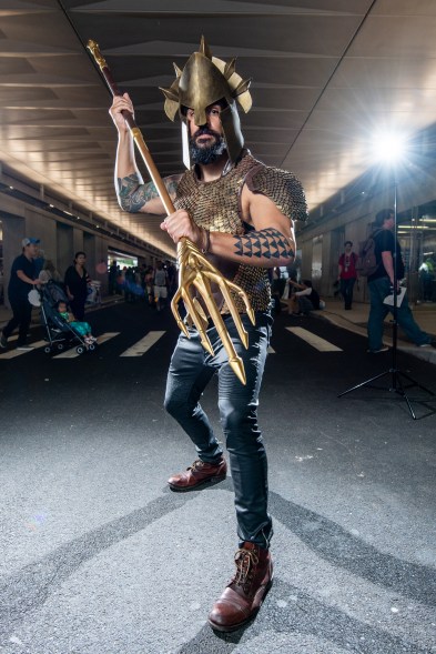 A fan cosplays as Aquaman.