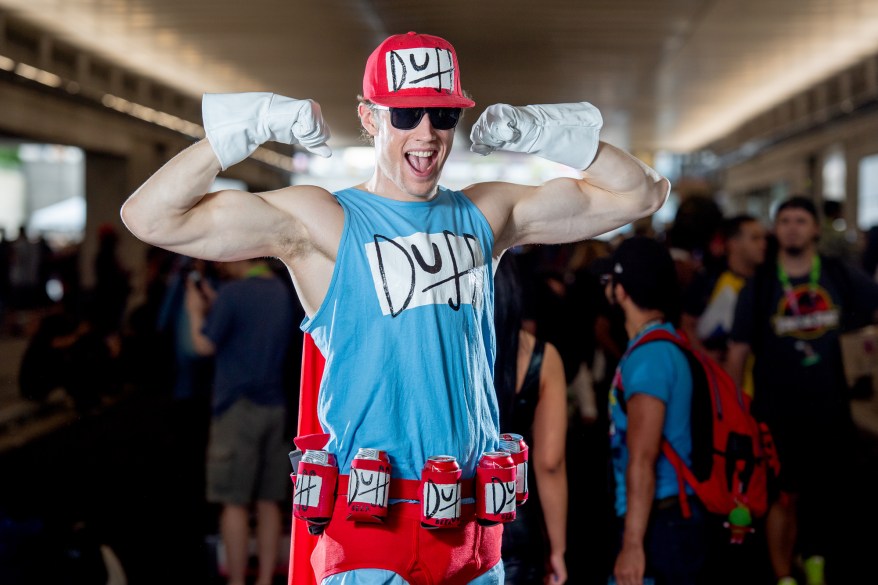 A fan cosplays as Duffman from The Simpsons.