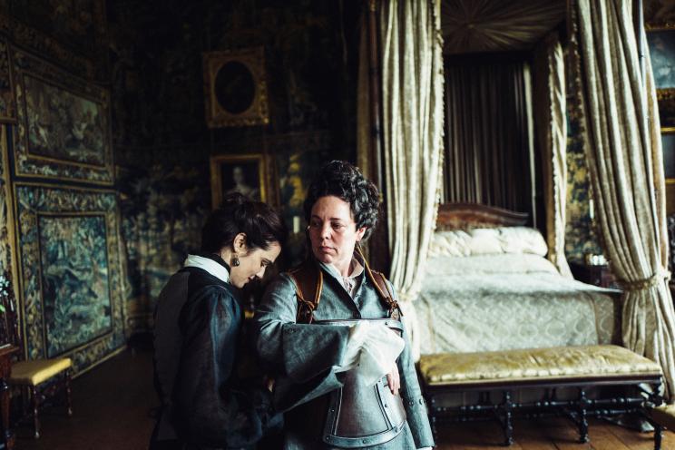 This image released by Fox Searchlight Films shows Rachel Weisz and Olivia Colman, right, in a scene from the film "The Favourite." (Yorgos Lanthimos/Fox Searchlight Films via AP)