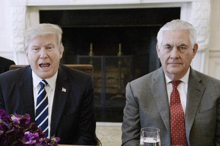 Donald Trump and Rex Tillerson speak in 2017.