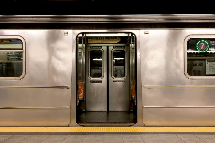 Subway doors open.