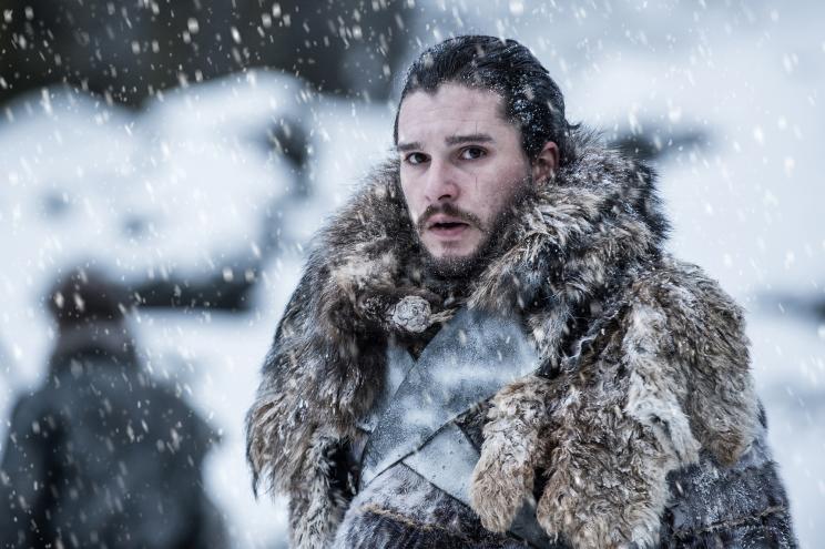 In this photo provided by HBO, Kit Harington portrays Jon Snow in a scene from the seventh season of HBO's "Game of Thrones." Piracy is a long-running and even routine issue for Hollywood, whether it’s street vendors hawking bootleg DVDs on street corners or video uploaded to file-sharing sites like Pirate Bay. Now cybercriminals are also putting embarrassing chatter and other company secrets at risk. Separately from HBO’s recent run-ins with hackers, upcoming “Game of Thrones” episodes have leaked several times, and it is TV’s most pirated show. (Helen Sloan/Courtesy of HBO via AP)