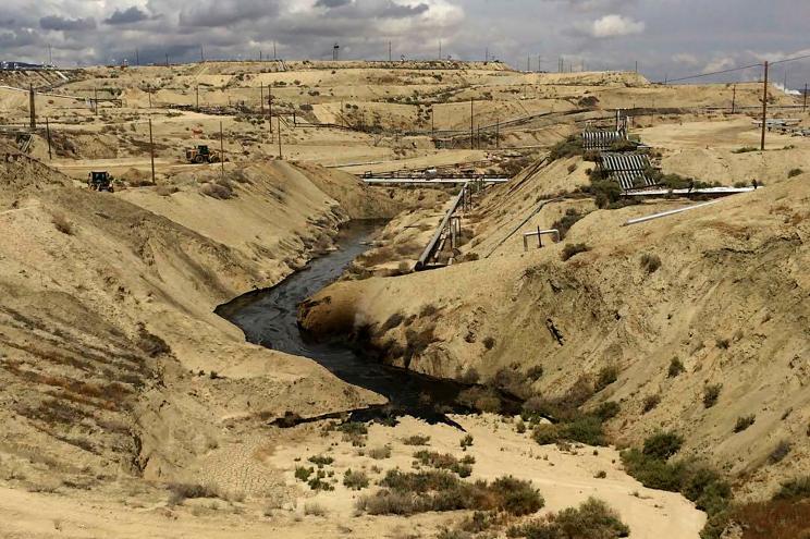 Oil flows at a Chevron oil field in Kern County, Calif.