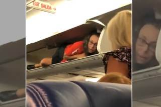 Flight attendant weirds out passengers by hiding in overhead bin