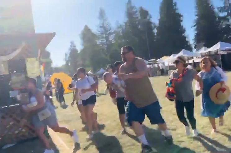 People run as an active shooter was reported at the Gilroy Garlic Festival