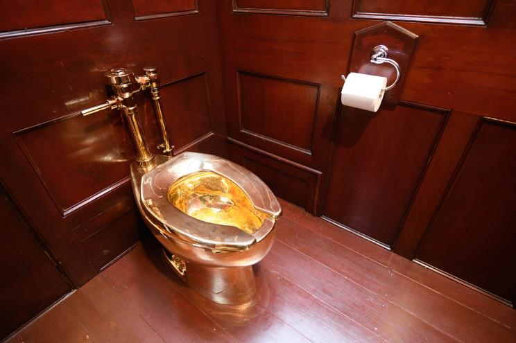 "America," a fully working, solid-gold toilet