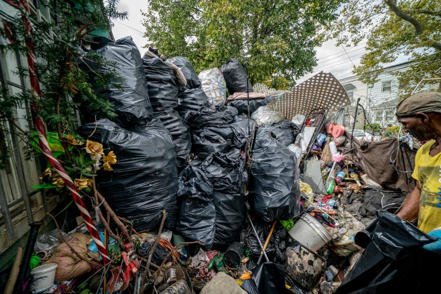 Carminee Bhimull's trash-filled home in South Jamaica, Queens.