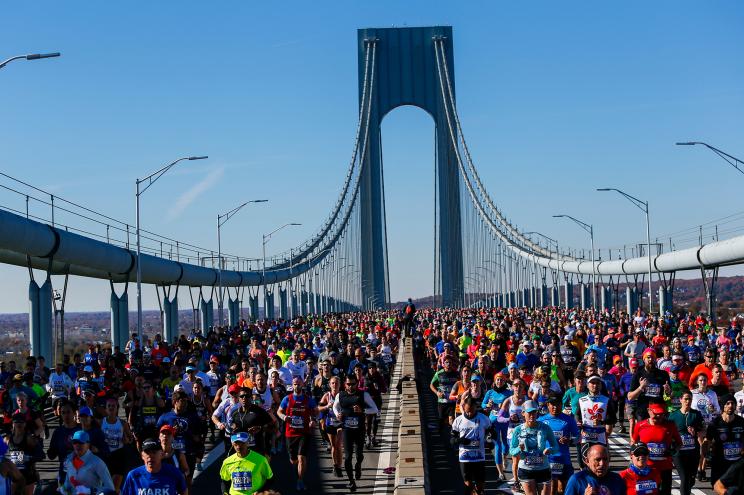 Runners stride across the Verrazano Bridge in the New York City Marathon