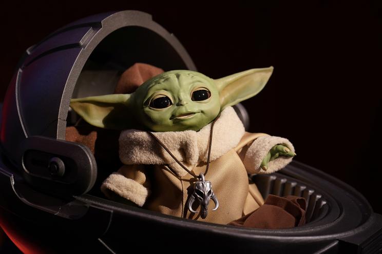 An animatronic Baby Yoda toy is pictured during a "Star Wars" advance product showcase