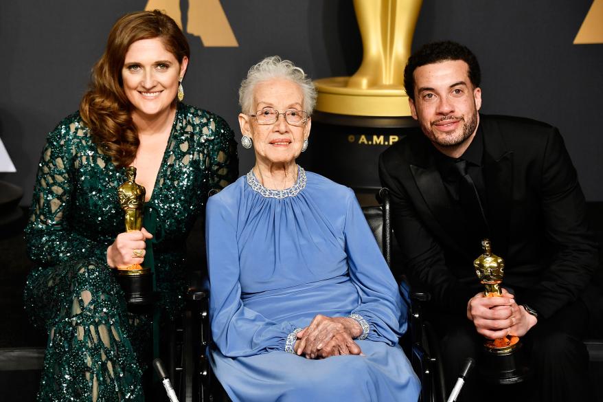 Katherine Johnson (center), director Ezra Edelman and producer Caroline at the 89th Annual Academy Awards.