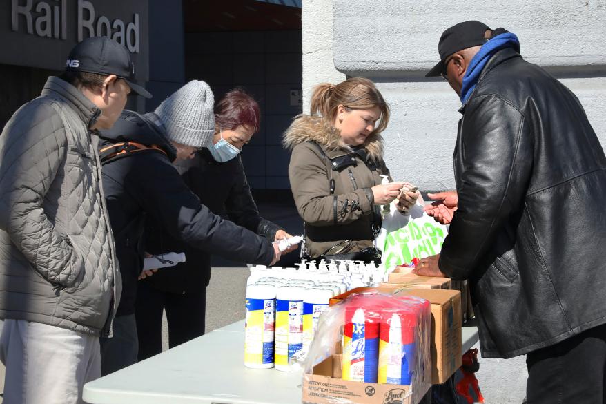 Street Vendor Samuel Hopkins a selling Hand sanitizers, Lysol and masks at the Corner of Main Street and 41st Avenue in Flushing, Queens.