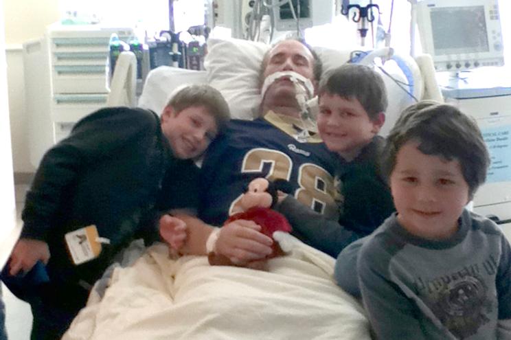 John Reynolds and his three children