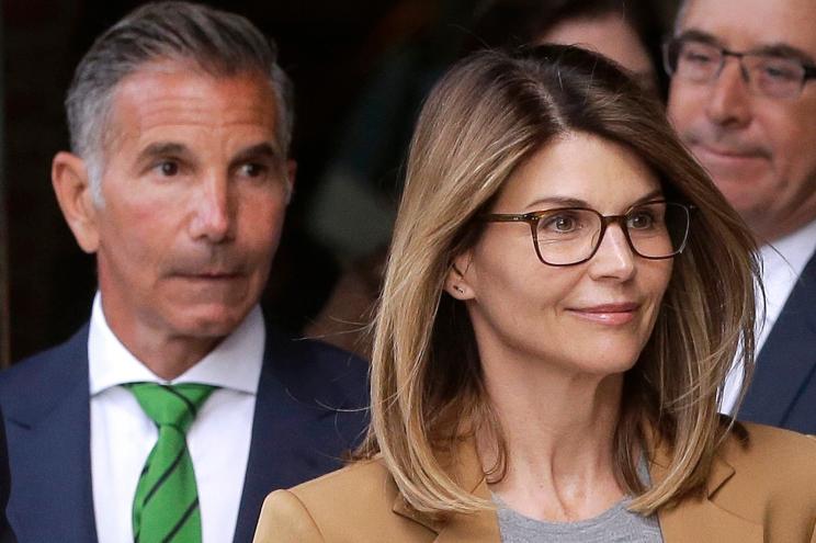 Lori Loughlin (right) and her husband, Mossimo Giannulli